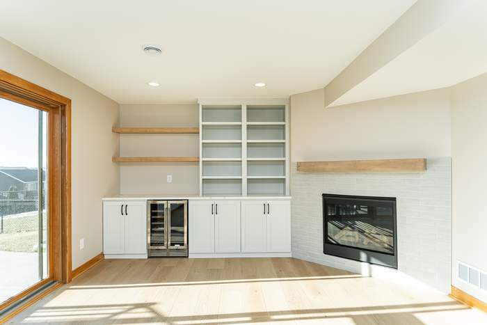 The Cascade — Fireplace and walkout