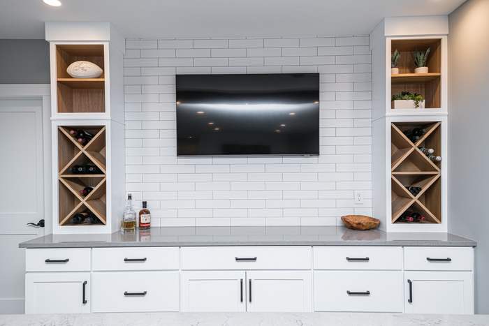 The Quarry Hill — Bar wall with wine storage