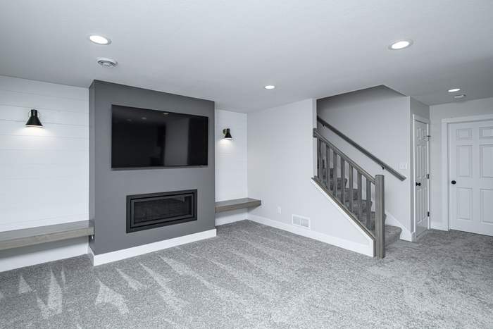 The Slate — Fireplace and stairs